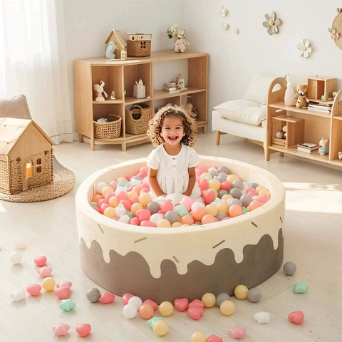 Toddler playing in a ball pit filled with pastel star and heart shaped plastic balls, 6 mix colors, Ball Pit Balls,Plastics Balls for Ball Pit.