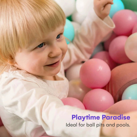 Child playing in a ball pit with Ball Pit Balls for Kids, 200 Pack - Plastic Refill Balls, Phthalate & BPA Free, Bright Colors.