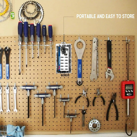 200 Pcs UTV Nylon Fender Clips And Body Rivets Kit with removal tool hanging on a pegboard with various tools