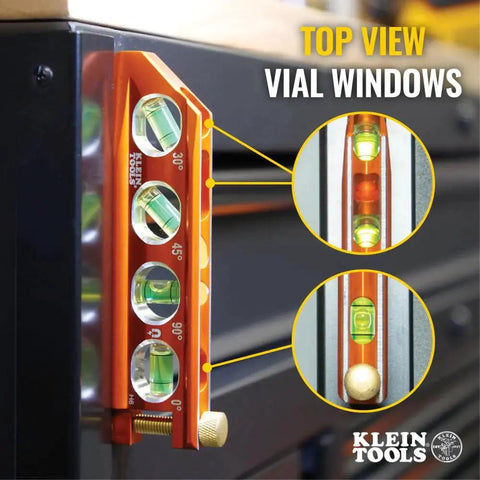 Compact 6-Inch magnetic torpedo level with a V-groove for conduit work delivers hands-free stability on metal surfaces, close-up of vial markers and thumb screw attachment on black surface