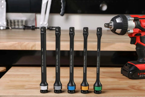 Foot/Pound Torque Limiting Extension Bar - Chrome Moly 1/2-Inch Drive 8-Inch Long Impact Grade Bar with color coding on a workbench