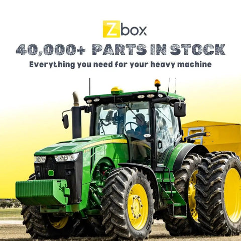 Green tractor in a field with text above advertising 40,000+ parts in stock from Zbox for heavy machinery.