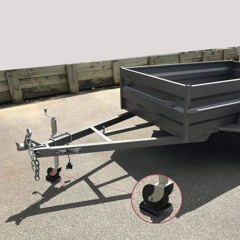 Heavy Duty Jack Wheel Chock With Reinforced Rubber Caster Dock under trailer jack wheel on pavement, close-up view included
