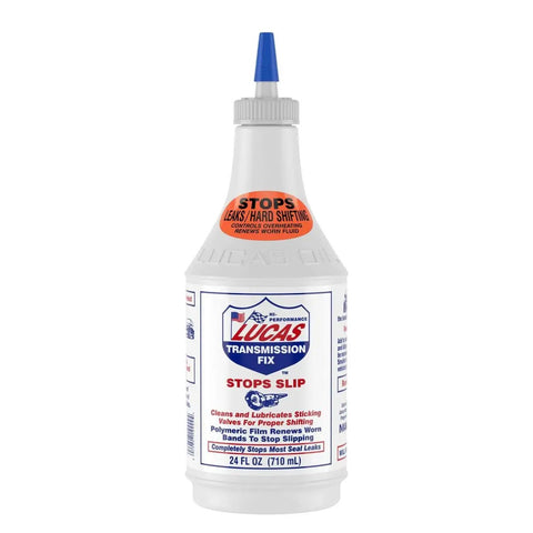 24 oz bottle of Lucas Transmission Fix with label detailing its use to stop slips and hard shifting in automatic transmissions.