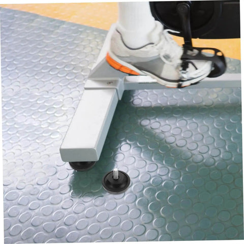 Two Pack Slip Resistant Treadmill Leveling Pads With Mounting Screws For Stable Fitness Equipment On Uneven Floors installed