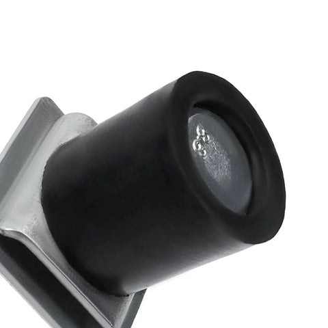 Close-up of steel and rubber 2 Pack Trolley Roller Wheels Limit Blocks For Strut Channel And Unistrut Sliding Doors, Heavy Duty Garage Door Rail Plug Accessories, Fits One And Five Eighths Inch Wide Strut Channel And All One And Five Eighths Inch Strut Channels, Steel Plate 2mm.