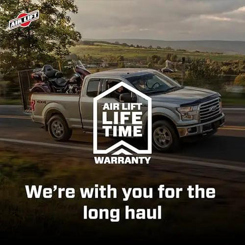 Premium air spring kit delivers up to 7500 lbs leveling, adjustable 5 to 100 psi, installed on truck with lifetime warranty badge