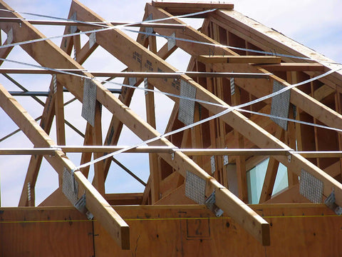 Wooden roof trusses with Truss Spacer Restraint Kit For Quick Accurate Spacing During Sheathing Pro Grade Galvanized 22 Gauge Steel TSBR2 24.