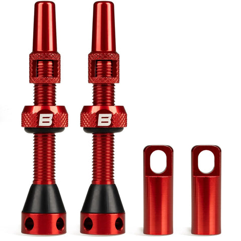 Pair of red alloy tubeless Presta valve stems with knurled collars and caps, B-brand.