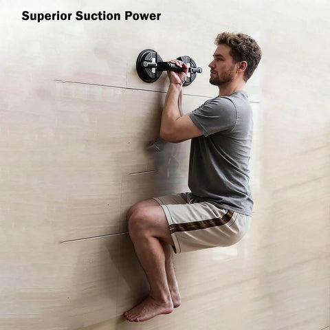 Man using Two Cup Pro Grade Aluminum Suction Cup Glass Lifter with High Vacuum Grip on wall surface, demonstrating suction power.