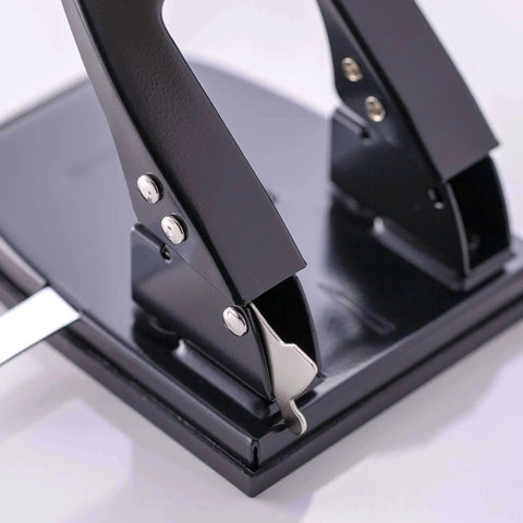 Close-up of Two Hole Paper Punch 30 Sheet Capacity Black with adjustable guide and easy chip tray, ideal for office and school use.