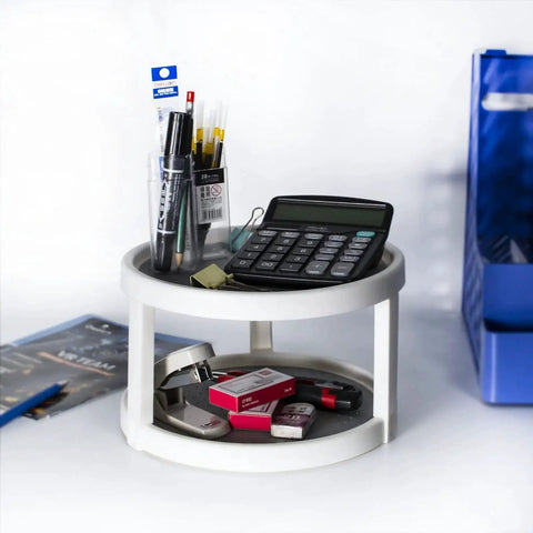 Two Tier Rotating Lazy Susan Organizer with non skid base holding office supplies, calculator, and stationery items, 10 inch spinning unit