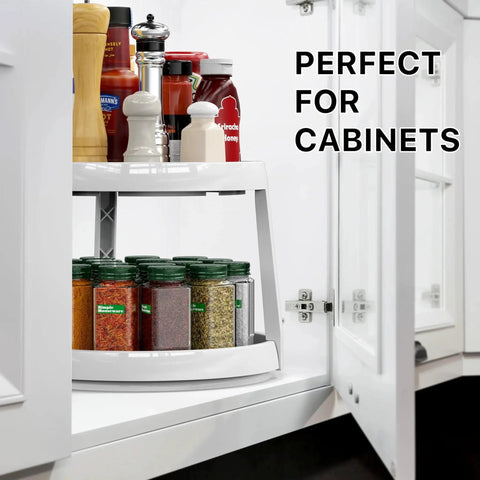 Two Tier Lazy Susan Spice Organizer 10 Inch Rotating Turntable for Cabinets and Countertops with spices displayed in a cabinet.