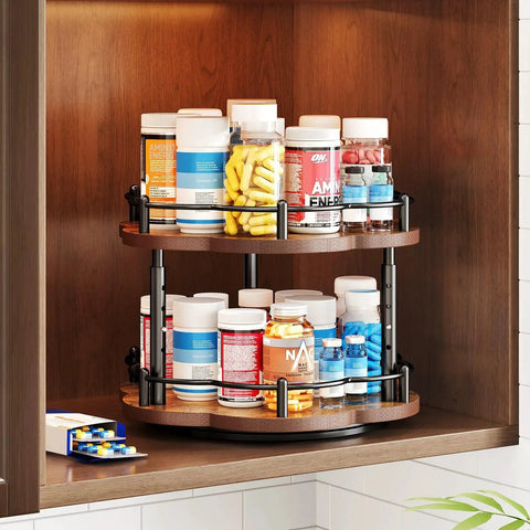 Two Tier Wood Lazy Susan Spice Rack Organizer with 360 Degree Rotating Turntable holding jars in a cabinet