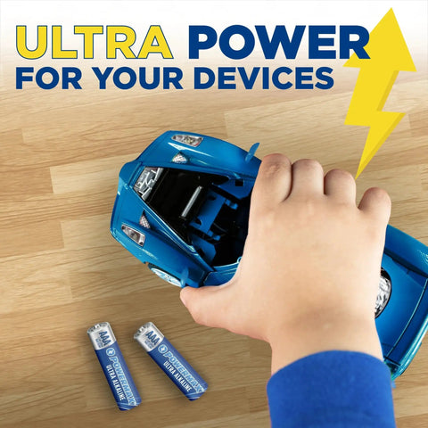 Child's hand placing 24 Pack AAA Alkaline Batteries Ultra Long Lasting For Home And Office Use into toy car on wooden surface