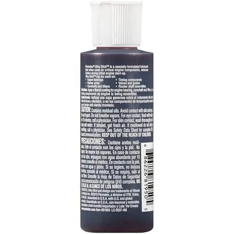 Side view of Permatex 81950 Ultra Slick Engine Assembly Lube, 4 oz., Red bottle showing label instructions and warnings.