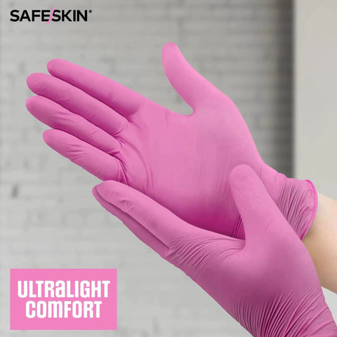 Ultralight Nitrile Gloves 2.0 Mil Powder Free Latex Free Magenta X Large 100 in use, showcasing lightweight comfort