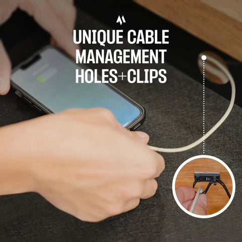 Close-up of a hand using the Under Desk Drawer Slide Out Attachment in Carbon Steel with Matte Black Finish, showing cable management feature.