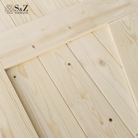 Close-up of 60in x 84in Unfinished British Brace Knotty Barn Door, Solid Spruce Wood, Pre Cut and Pre Drilled Panels for Simple Assembly