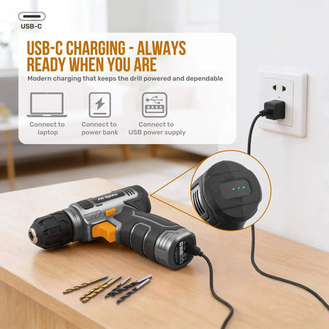 USB Rechargeable 8V Cordless Drill Set With Handy Lightweight Tool Kit For Everyday Home Repairs Furniture Assembly And DIY Projects In A Compact Toolbox Case With 1500mAh Battery And Easy Bit Changing, shown charging on a table with drill bits.