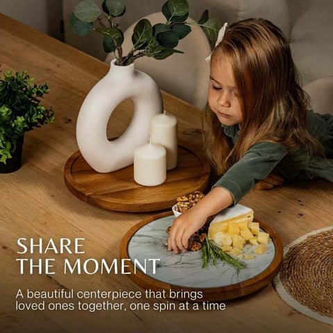 12 inch acacia wood lazy susan turntable with removable glass plate, featuring a child serving cheese on a marble texture tray.