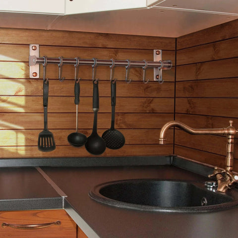 Kitchen Utensil Holder Hanger, Pot and Pan Rack Wall Mount, Stainless Steel Antique Copper with 8 Hooks holding utensils on wall