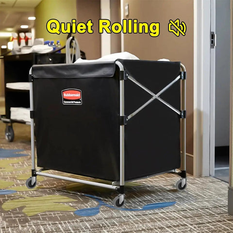 Laundry cart with black fabric and metal frame, supported by 4 inch swivel stem caster wheels, gently rolling on carpeted floor.