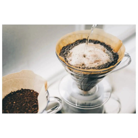 Natural V60 Size 02 paper coffee filters deliver a clean, balanced 1-4 cup brew with reliable flow, 200-count pack, close-up