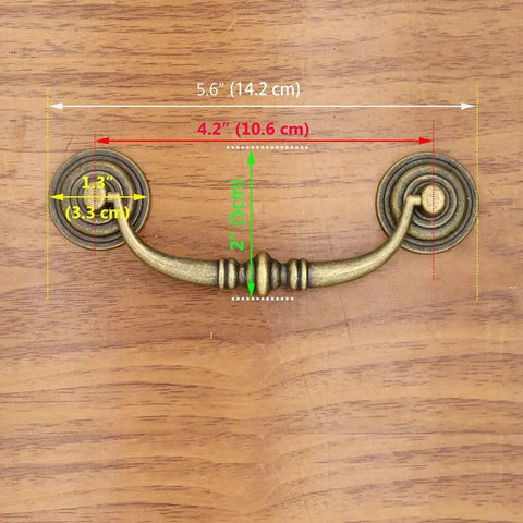 Four Piece Vintage Antique Brass Bail Pull Handle Set For Wooden Drawers Cabinets And Cupboards, showing dimensions and design