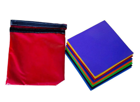 Nine 8x8 inch patches from Ultimate DIY Pro Grade Vinyl Repair Patch Kit for Commercial Inflatables, visible in assorted colors.
