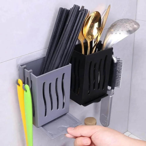 Wall-mounted multifunctional kitchen utensil rack draining chopstick holder, black finish, storing cutlery and tools in organized compartments.