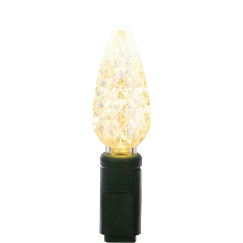 Close-up of a single bulb from the Warm White C6 LED Christmas Light Strand On Green Wire With 50 Bulbs 25 Feet Single Mold Design