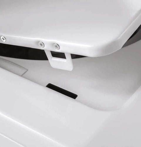 Close-up view of the hinge detail on the Compact 27 inch unitized washer and electric dryer in one space-saving cabinet.