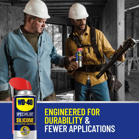 Two workers using WD-40 Specialist Silicone Lubricant with SMART STRAW SPRAYS 2 WAYS, 11 OZ in a construction setting