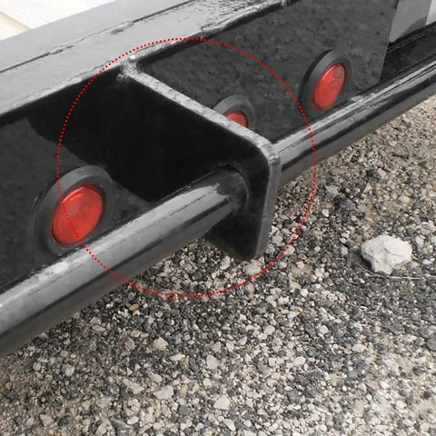 Close-up of installed Two Pack Weld On Trailer Ramp Gate Hinge Holder Bracket For Dump Trailers Fits One And A Half Inch Shaft Made From Low Carbon Steel With Plain Finish Includes Three Eighth Inch Holes And One And Five Eighth Inch Mounting Holes For Ramp Hinges on a trailer frame.