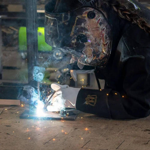 Welder using Three Thirty Second Inch E6013 Welding Rod 5 Pound All Position for Easy Wetting and Smooth Beads Low Spatter AC Or DC