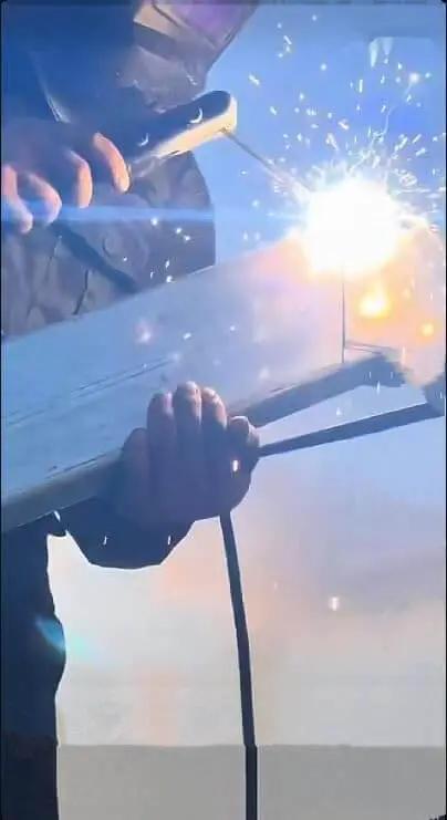 Welder using E6013 Welding Rods For AC DC 3 32nd Inch 1 Pound Carbon Steel Stick Electrodes By Wisuno, creating stable arc with low splash