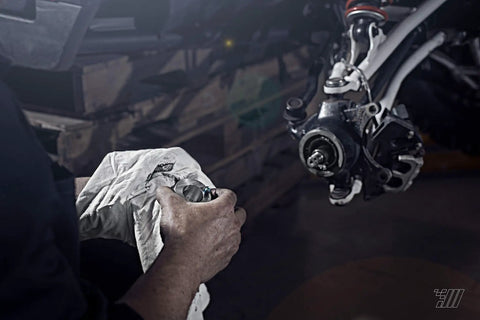 Mechanic using 44mm Wheel Bearing Greaser For Polaris RZR 900 1000 And Pro XP Jansen Motorsports on ATV UTV SxS