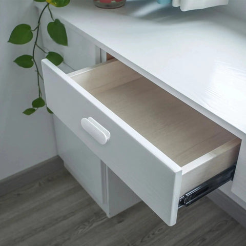 White plastic stick-on handle on open drawer; 2 Pack Self Adhesive Push Pull Cabinet Handles No Drilling Plastic Stick On