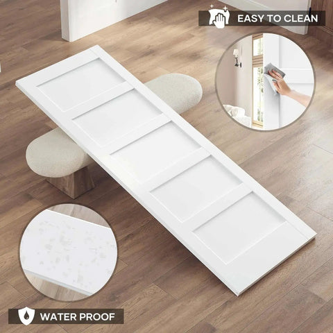 White 32x84 Inch Sliding Barn Door Slab With 5-Panel MDF Panels, Waterproof PVC surface shown in living room setting.
