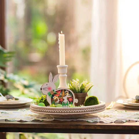 Round White Beaded Wood Lazy Susan Turntable For Kitchen Counter And Tabletop Decor 12 Inch Spinning Tray For Spices Condiments And Coffee Table Centerpiece In Rustic Farmhouse Style, decorated with rabbit ornament, candle, and greenery.