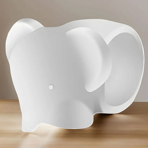 Soft silicone door wall protector cushions every swing to prevent scuffs, reduces door noise, elephant shaped, white, side view