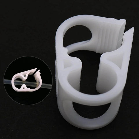 LUORNG Flow Control Hose Clamp Set 4 Pieces For 1/4 To 1/2 Inch Tube OD Adjustable Plastic Tube Clamp close-up view white
