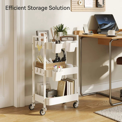 Versatile 3 Tier Rolling Cart With Locking Wheels Hanging Cups And Hooks Heavy Duty Metal Storage Organizer For Kitchen Office Bathroom Craft Room White next to desk