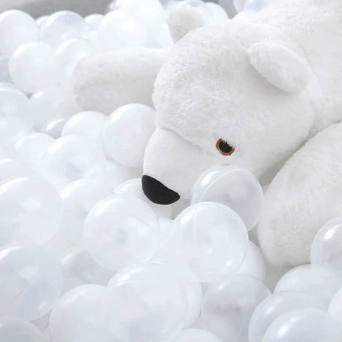 Ball Pit Balls Phthalate Free BPA Free Non-Toxic Crush Proof Play Balls for Toddlers Kids next to a white plush toy.