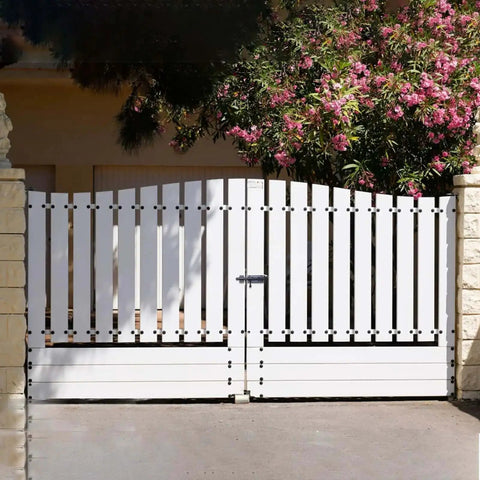Wooden gate with Heavy Duty 6.3 Inch Gate Latch Barrel Bolt Slide Lock in Solid 304 Stainless Steel and Black Finish, installed on driveway.