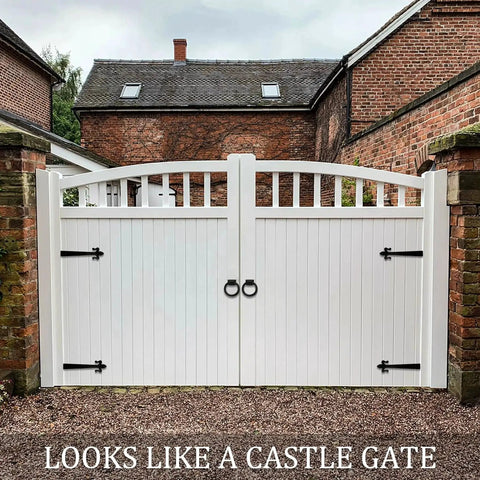 White wooden gate with Matte Black Ring Garage Door Pull 3.9 Inch Metal Sliding Barn Door Handle Knob For Farmhouse Decor
