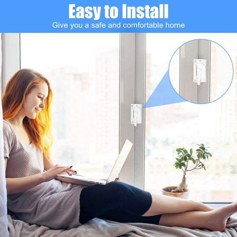Woman relaxing with a laptop next to a window fitted with a Zinc Alloy Window Sash Lock Replacement Kit For Up And Down Double Hung Windows Horizontal Cam Action Latch With Keeper Durable Anti Rust Security Locks For Sliding Windows.