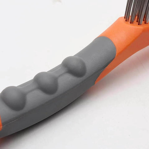 Close-up of the handle of a Heavy Duty Stainless Steel and Carbon Steel Wire Brush with ergonomic grip design.