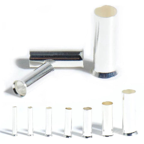 Assorted sizes of 1100 Piece Wire Ferrules Kit With Tinned Copper Crimp Connectors For Electrical Cables, non-insulated terminal ends visible.